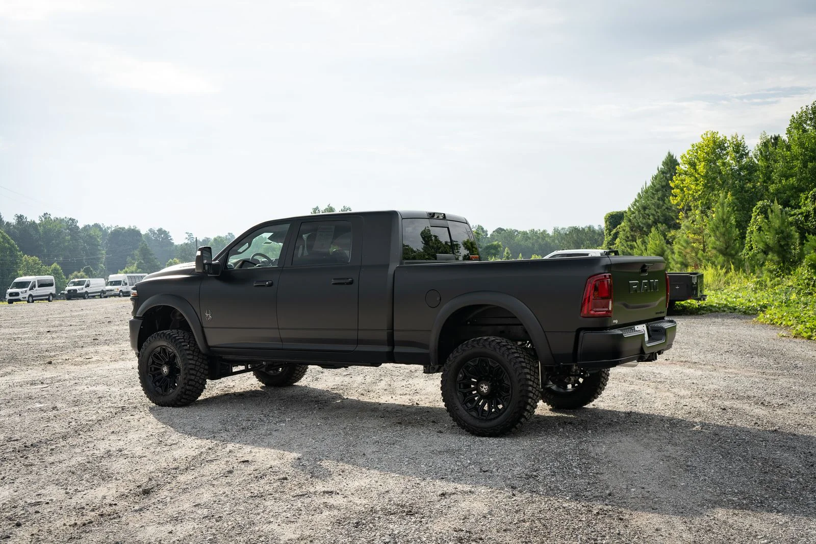New 2026 Diamond Black Crystal Pearl-Coat Exterior Paint RAM Laramie with Black Widow Package image 15