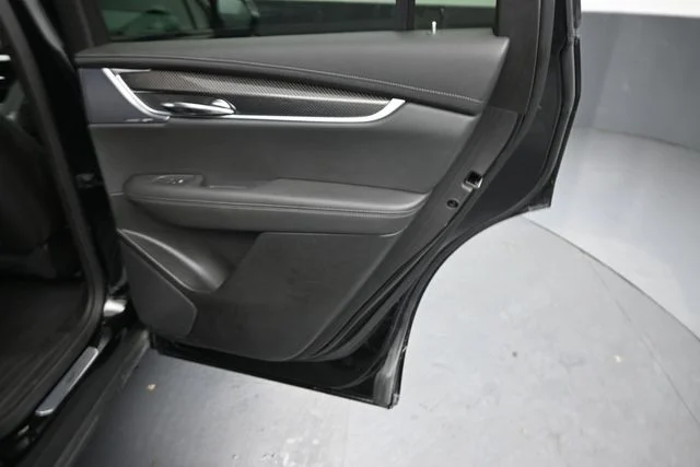 Certified Used 2025 Stellar Black Metallic Cadillac Sport image 28