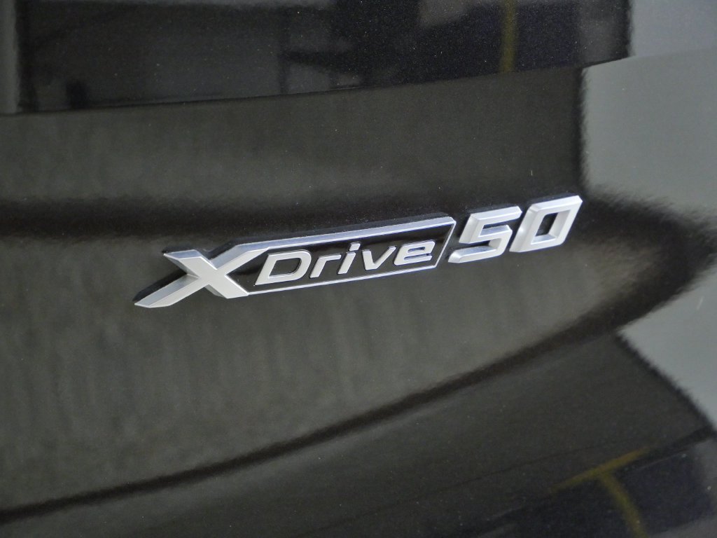 Used 2024 Black BMW xDrive50 image 12