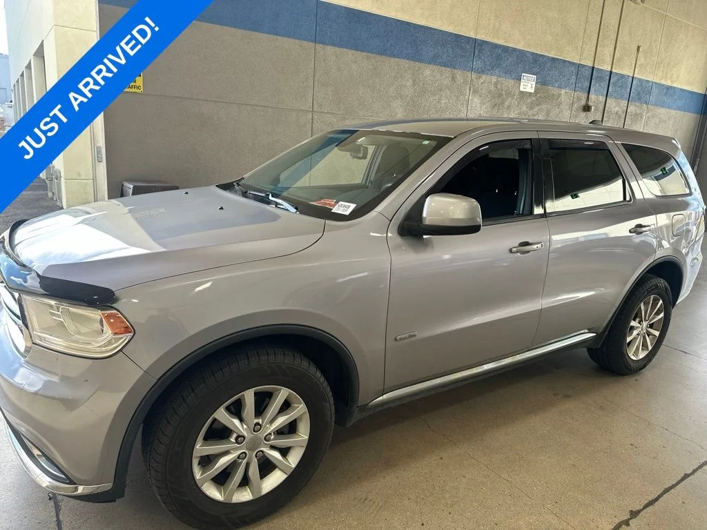 Used 2015 Billet Silver Metallic Dodge SXT image 1