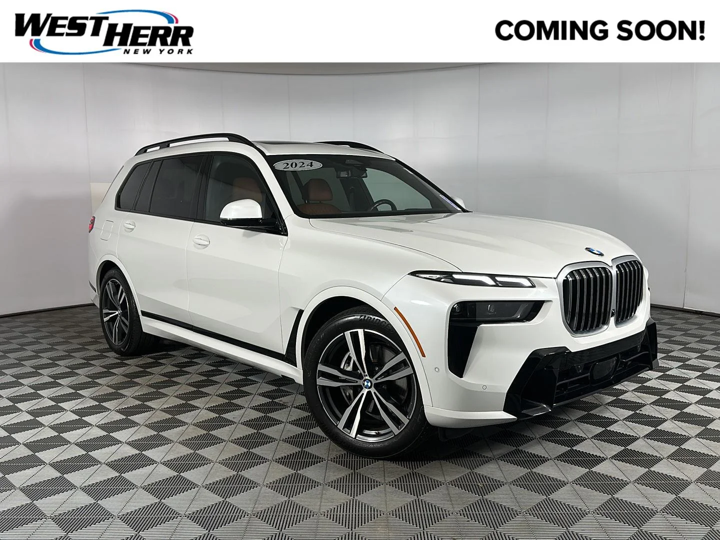 Used 2024 Mineral White Metallic BMW xDrive40i image 1