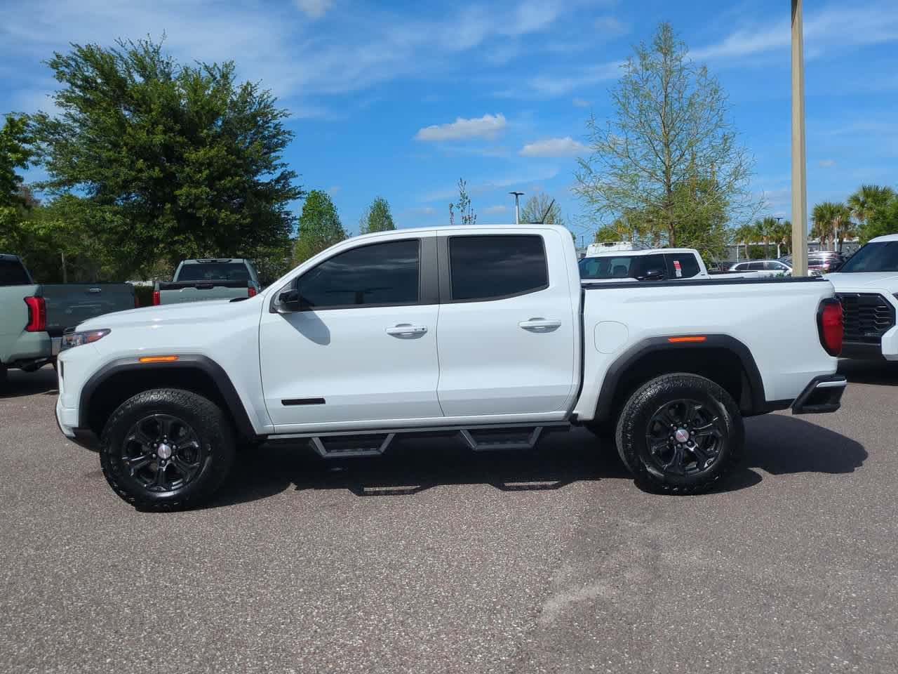 Used 2024 Summit White GMC 2WD Elevation image 3