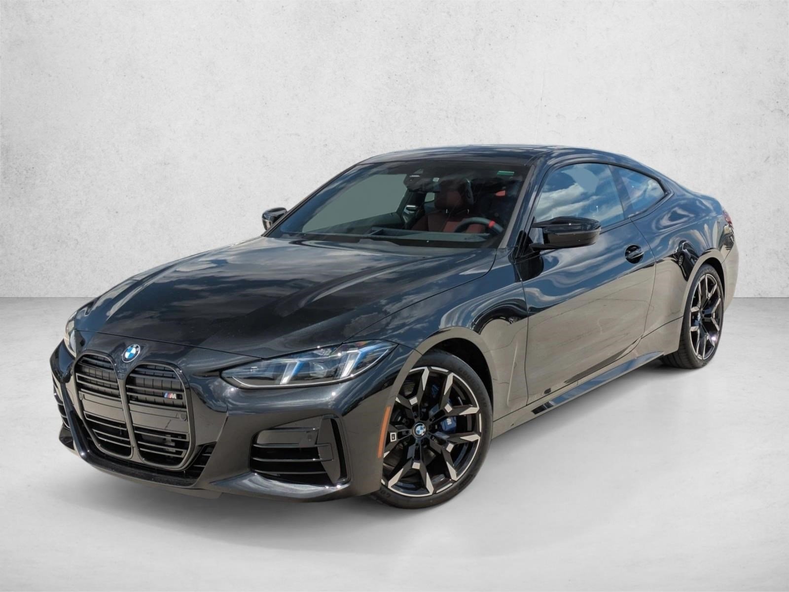 Used 2026 Black Sapphire Metallic BMW M440i image 1