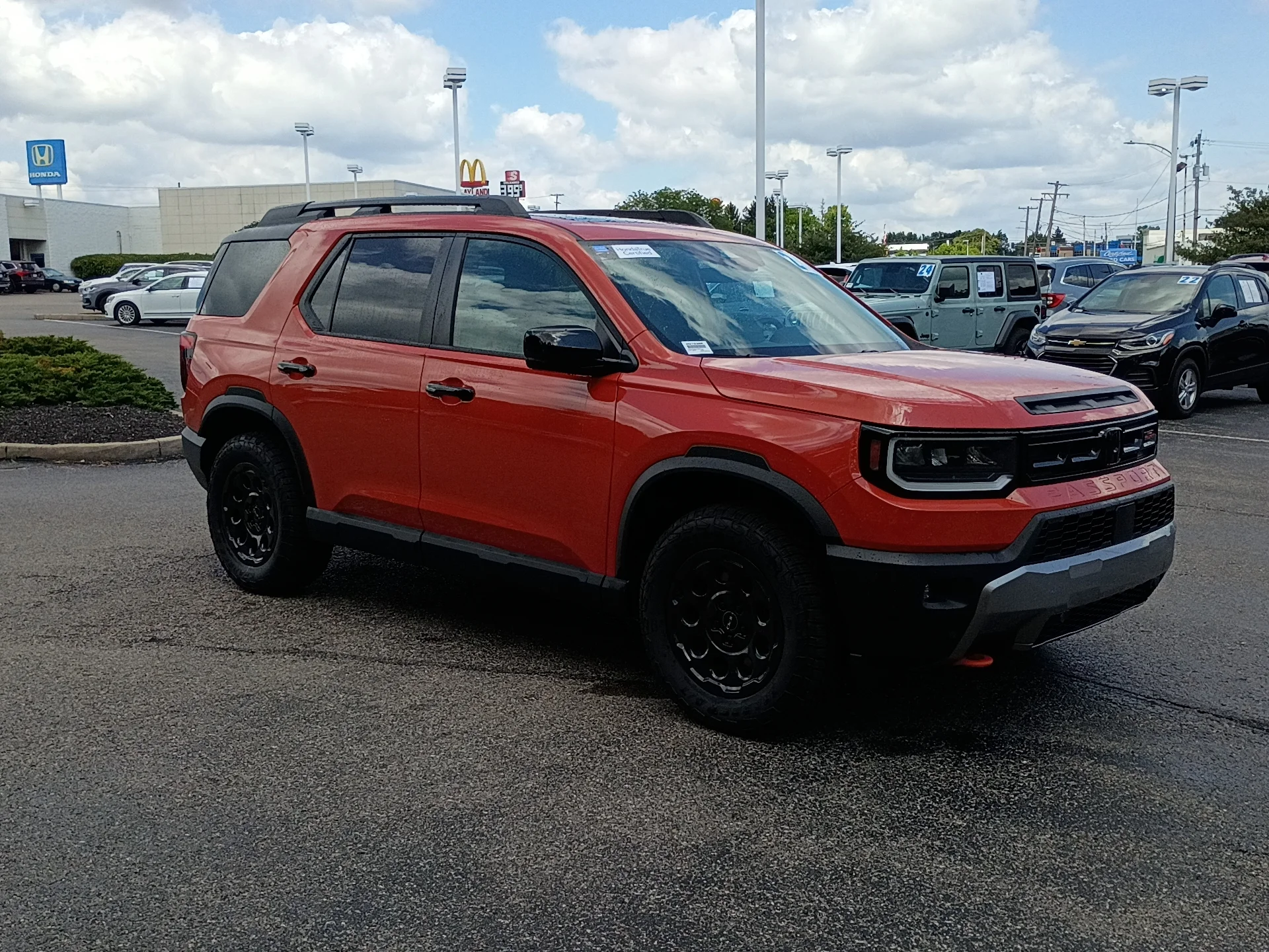 Certified Used 2026 Sunset Orange II Honda TrailSport Blackout image 1