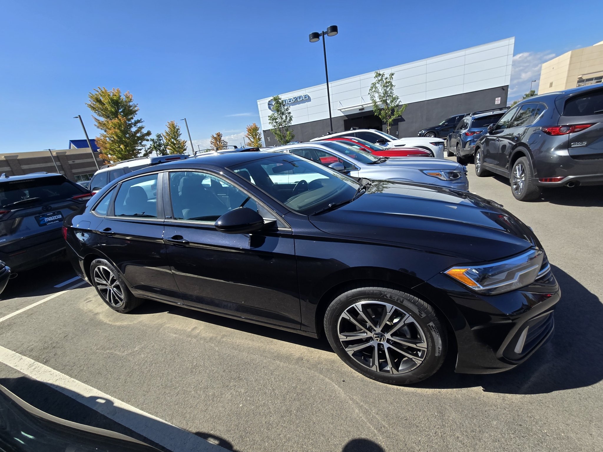 Used 2024 Deep Black Pearl Volkswagen Sport image 6