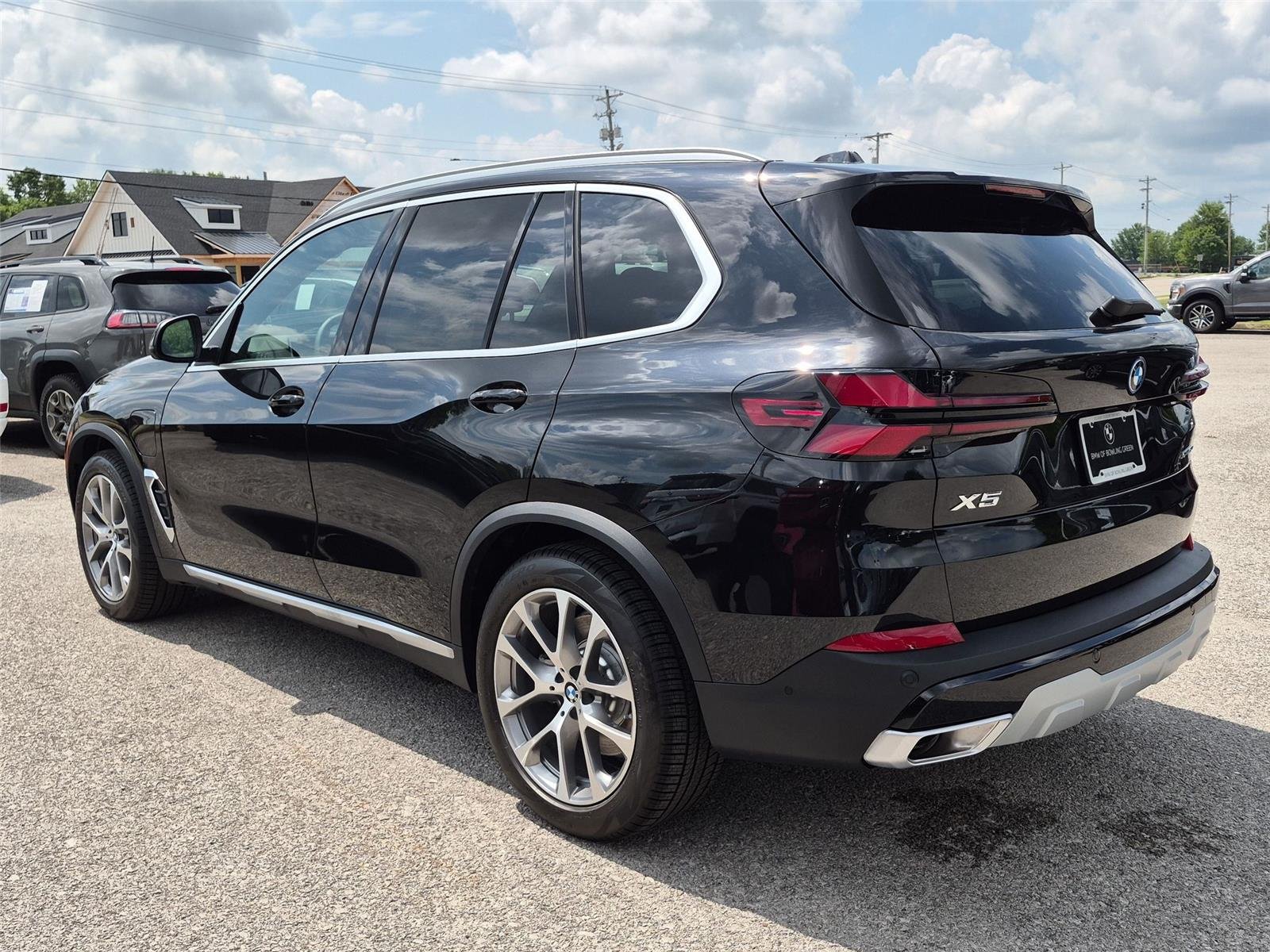 New 2026 Black Sapphire Metallic BMW xDrive50e image 3