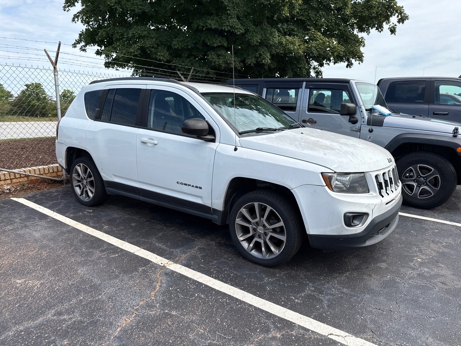 Used 2016 Bright White Clear Coat Jeep Sport SE image 1