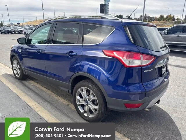 Used 2014 Blue Ford Titanium image 4
