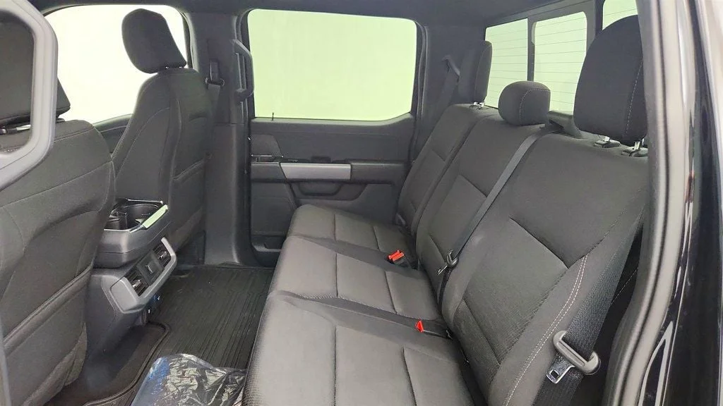 Used 2025 Agate Black Metallic Ford XLT 4WD SuperCrew 5.5