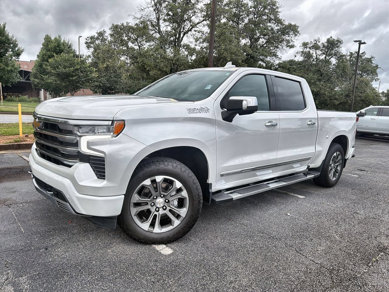 Used 2024 Iridescent Pearl Tricoat Chevrolet High Country image 1