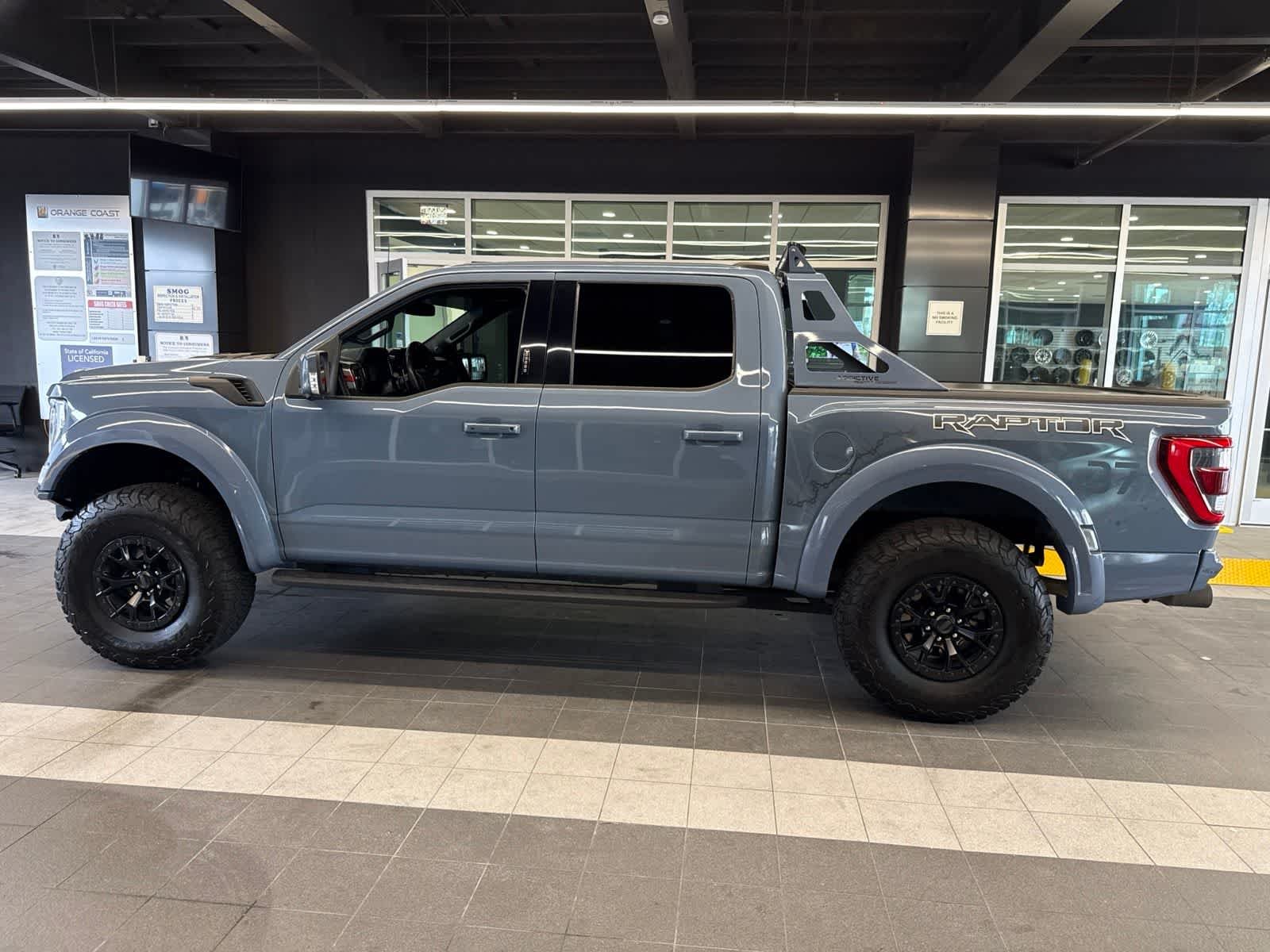 Used 2023 Azure Gray Metallic Tri-Coat Ford Raptor image 19