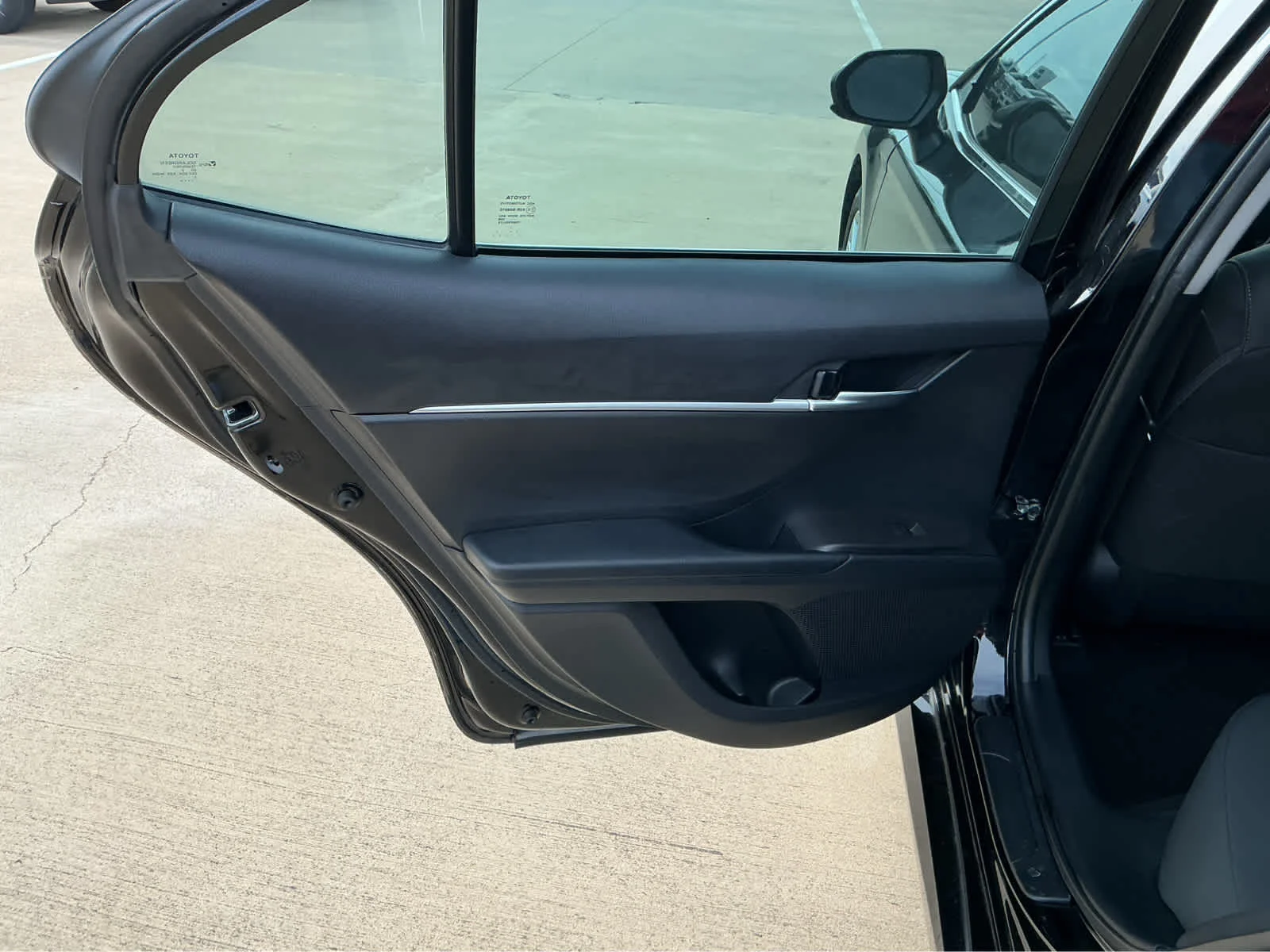 Used 2023 Midnight Black Metallic Toyota LE image 16