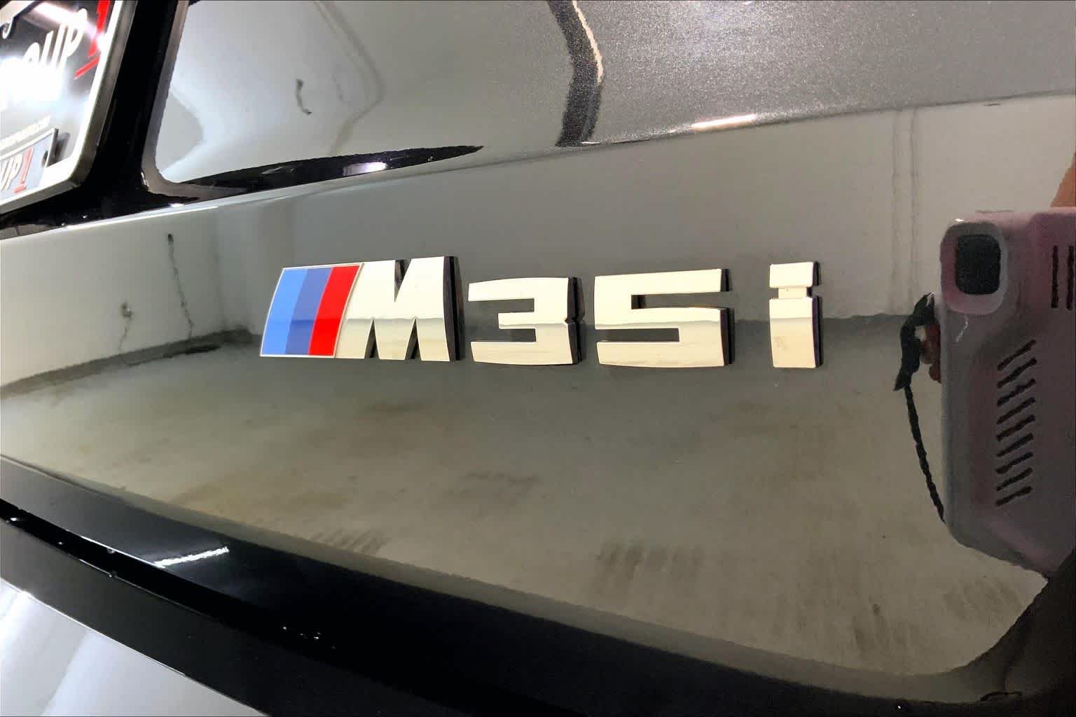Certified Used 2026 Black Sapphire Metallic BMW M35i image 9