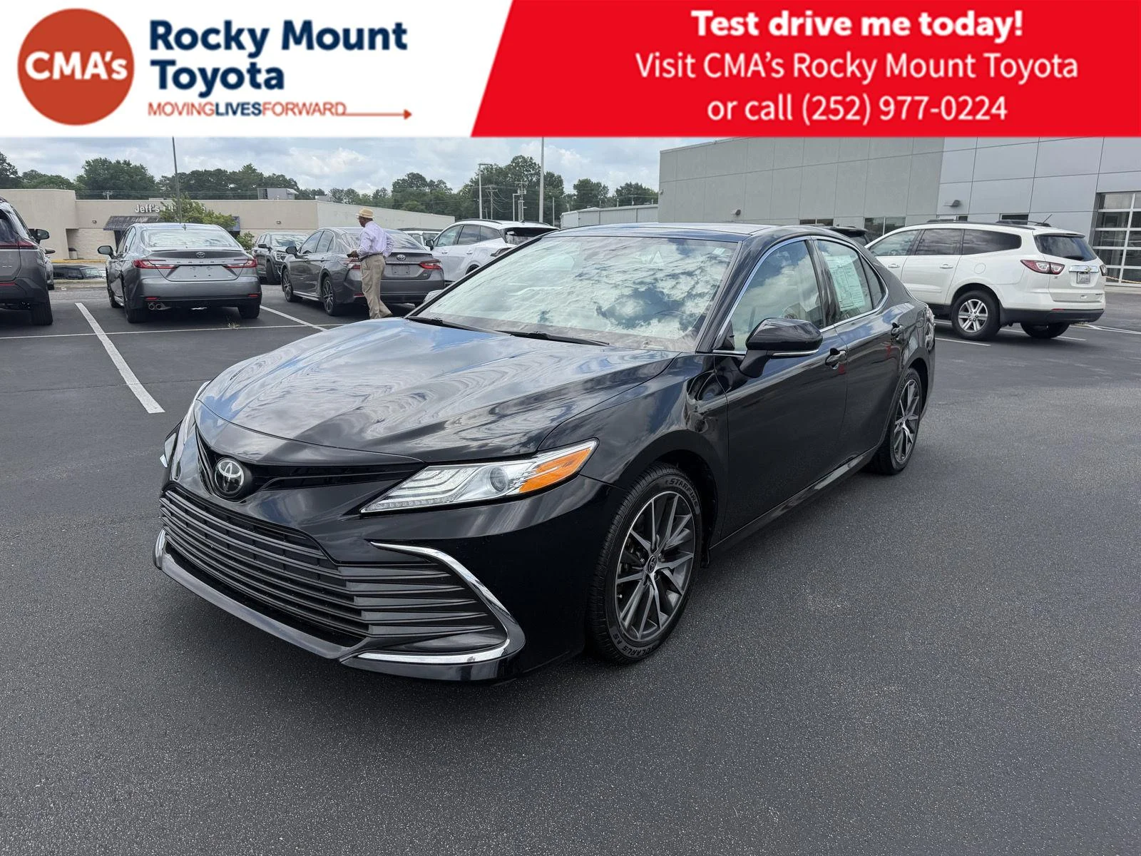 Used 2023 Midnight Black Metallic Toyota XLE image 1