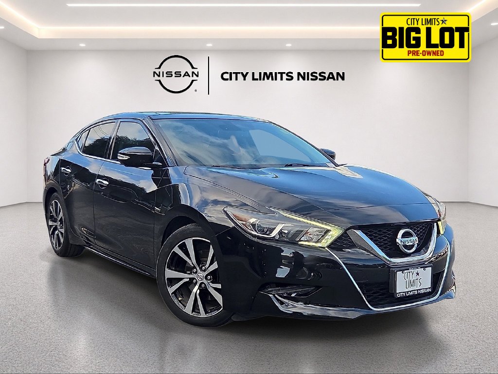 Used 2018 Black Nissan Platinum image 1