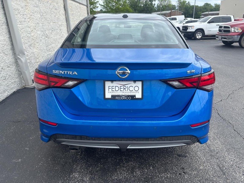 Used 2023 Electric Blue Metallic Nissan SR CVT image 4