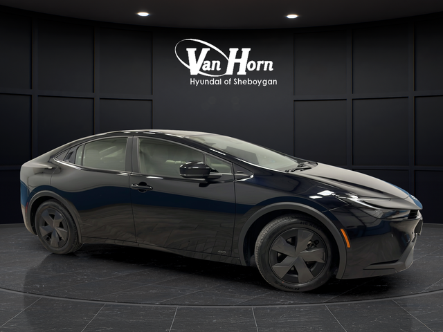 Used 2023 Midnight Black Metallic Toyota LE image 1