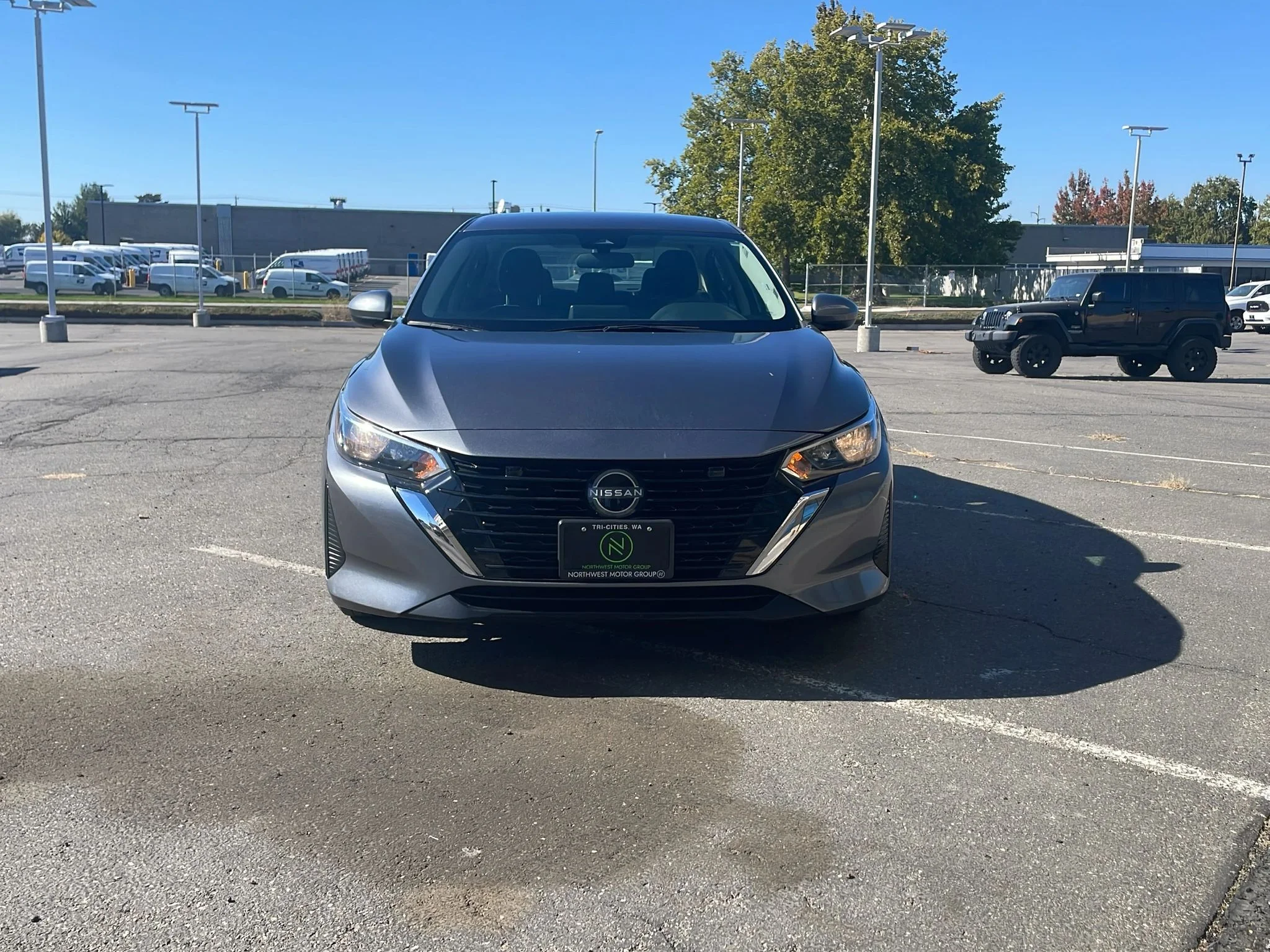 Used 2024 Gun Metallic Nissan SV image 2
