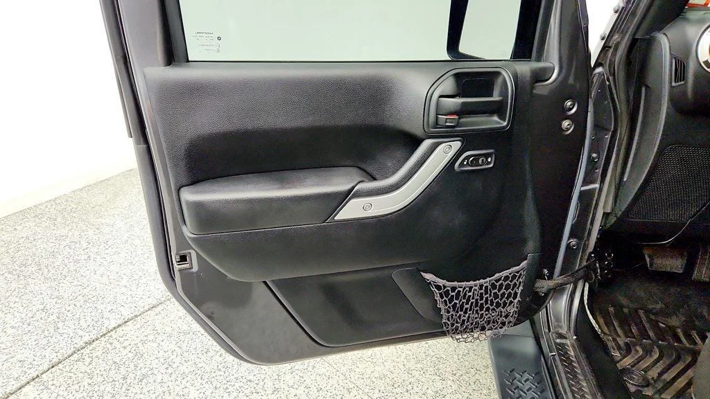 Used 2017 Granite Crystal Metallic Clearcoat Jeep Sahara 4x4 w/ Heated Seats, Remote Start & Connectivity Pkg image 10