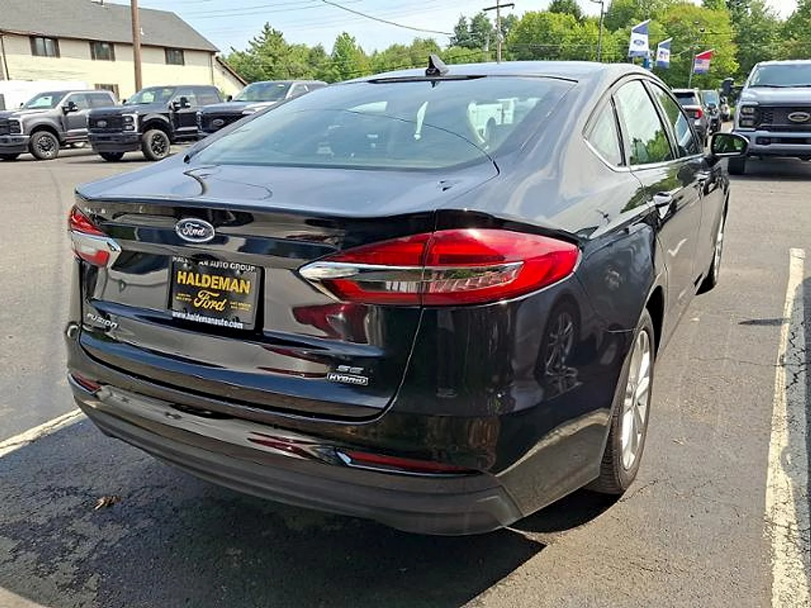 Used 2020 Agate Black Metallic Ford Hybrid SE image 8