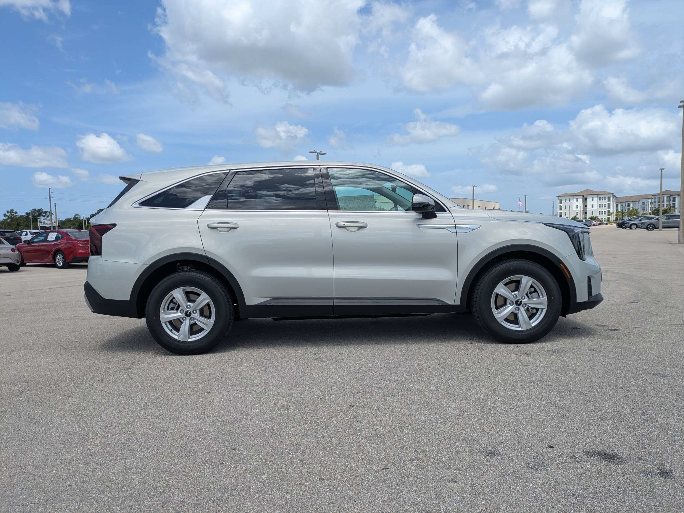 New 2026 Ivory Silver Kia LX image 4