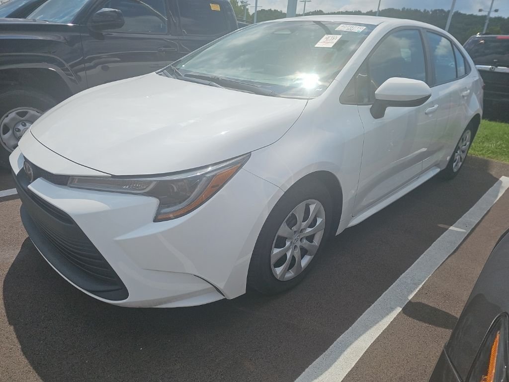 Used 2023 White Toyota LE image 1