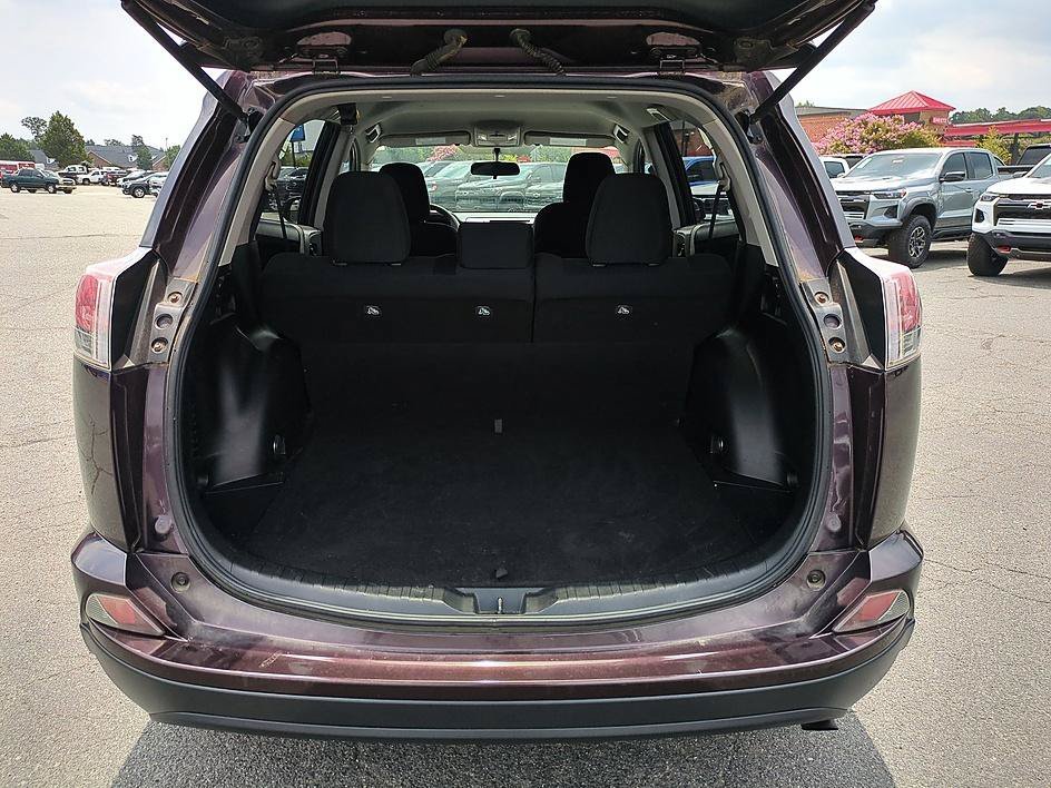 Used 2016 Black Currant Metallic Toyota LE image 28