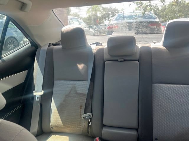 Used 2018 Barcelona Red Metallic Toyota LE image 4