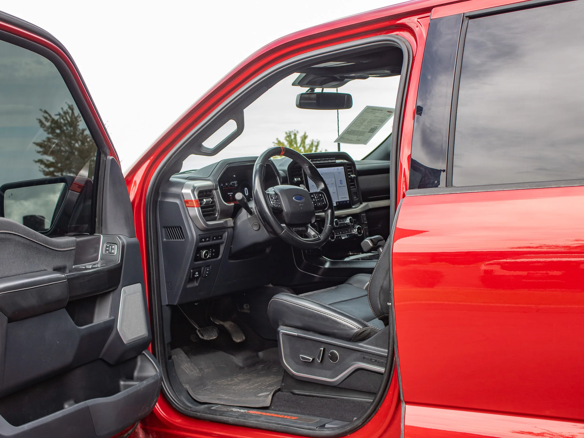 Used 2023 Rapid Red Metallic Tinted Clearcoat Ford Raptor image 23