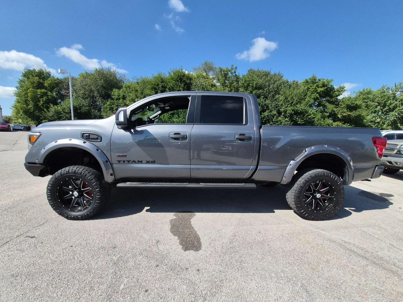 Used 2019 Gun Metallic Nissan SV image 2