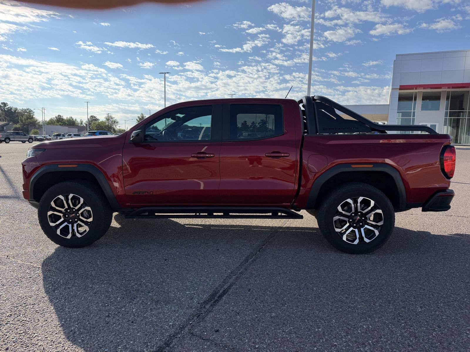 Used 2025 Volcanic Red Tintcoat GMC 4WD AT4 image 2