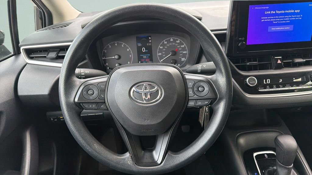 Used 2024 Black Toyota LE image 14