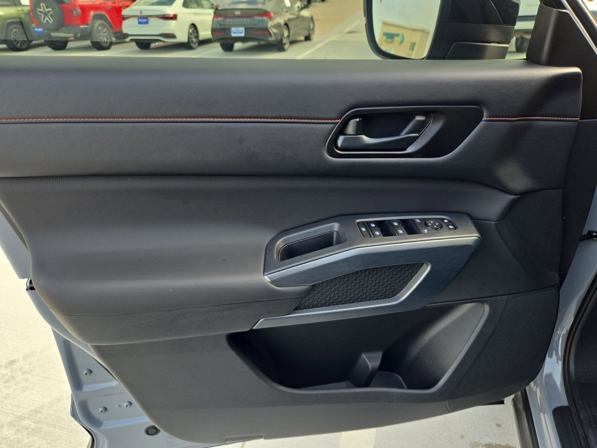 Used 2025 Solid Gray/Super Black Nissan Rock Creek image 13