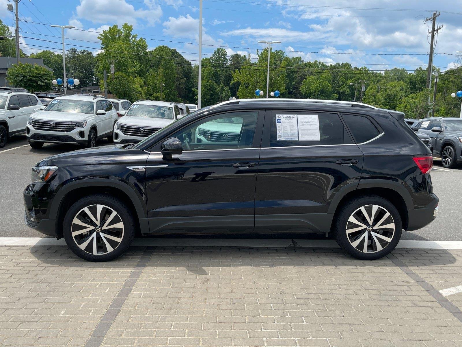 Used 2024 Deep Black Pearl Volkswagen SE image 2