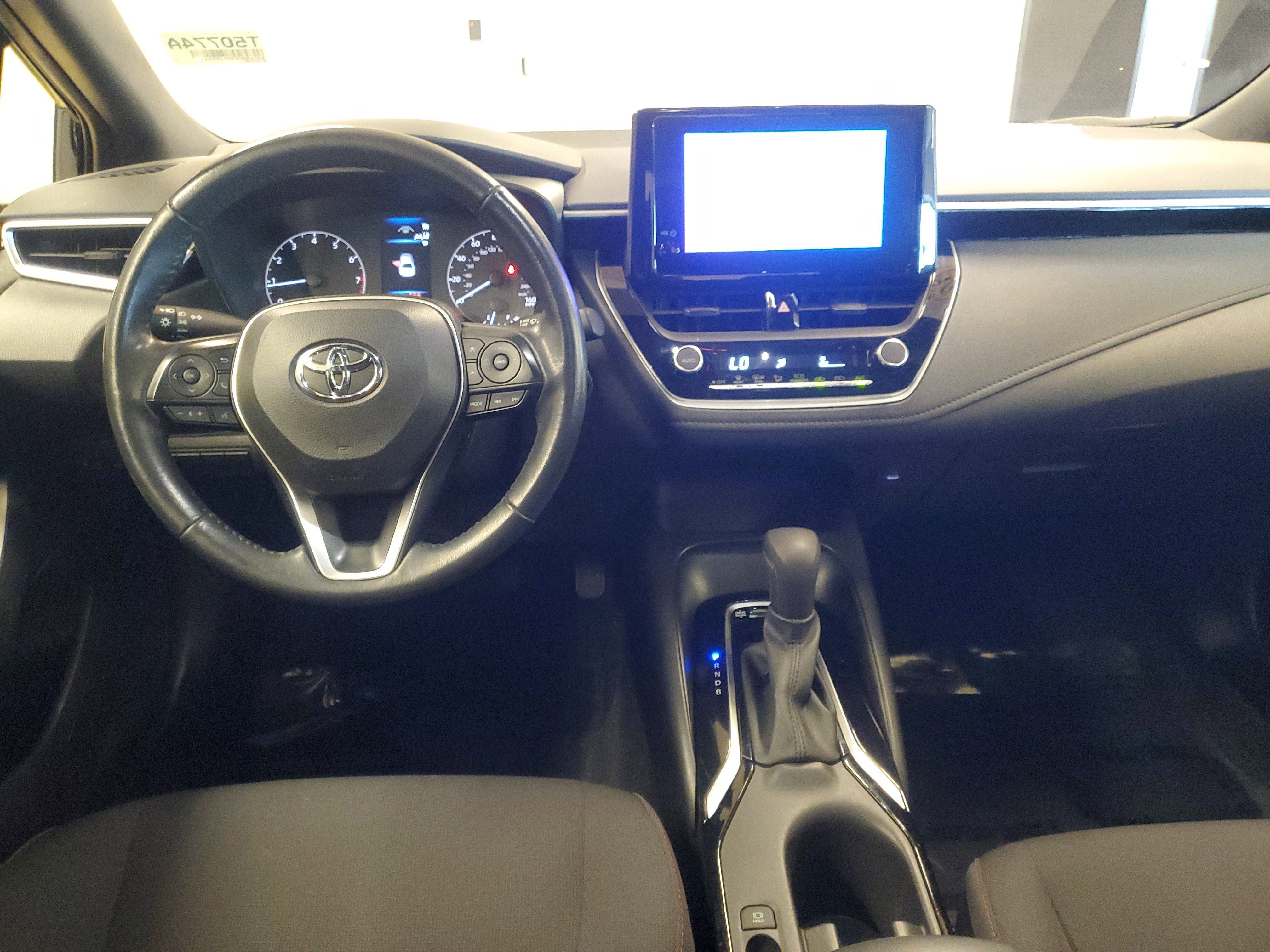 Used 2023 Midnight Black Metallic Toyota SE image 9