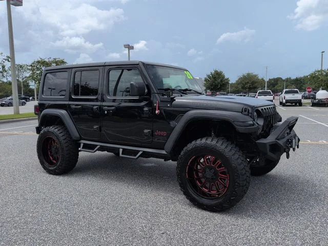 Used 2020 Black Jeep Unlimited Sport image 1