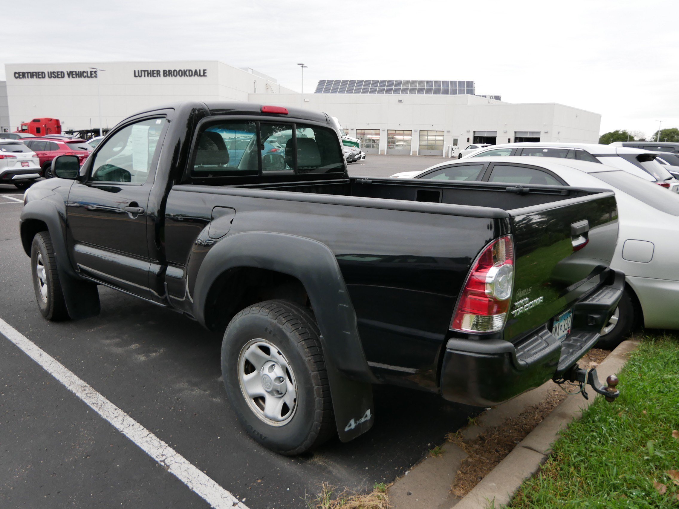 Used 2011 Black Toyota REG CAB 4WD AT image 4