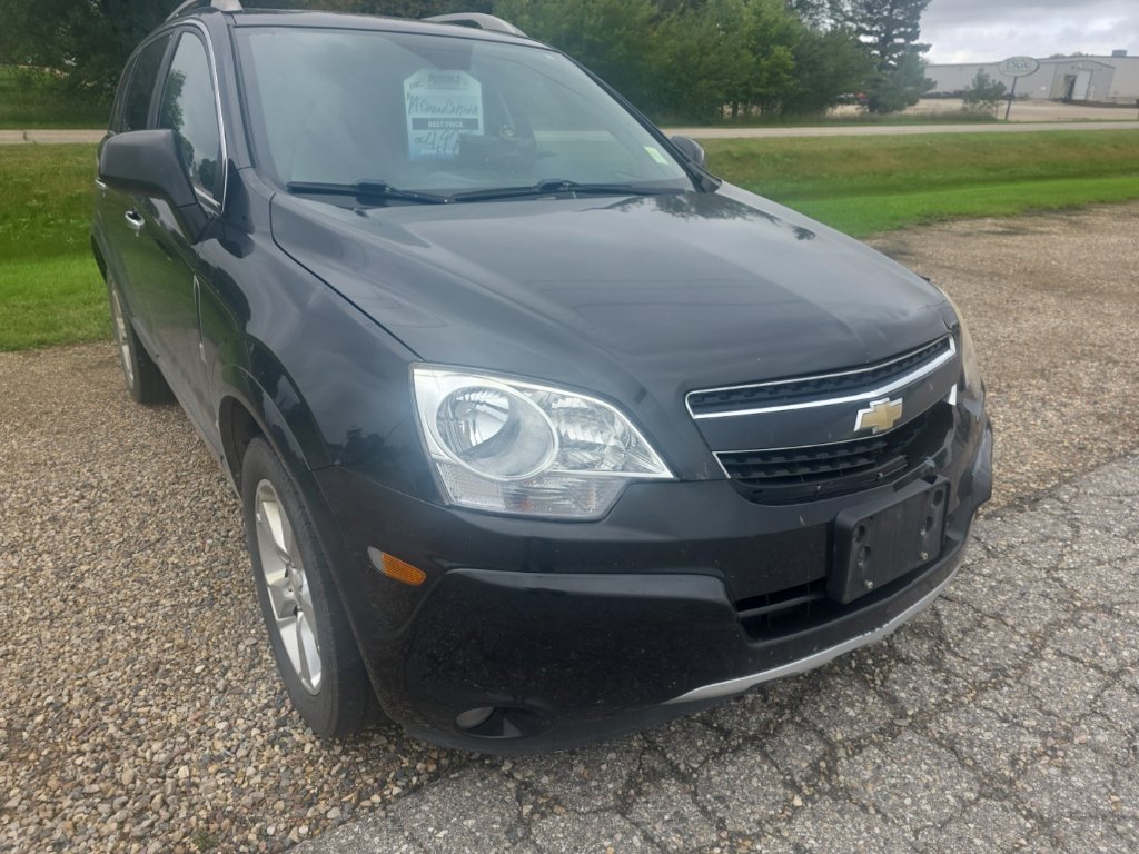 Used 2014 Black Chevrolet LTZ image 1