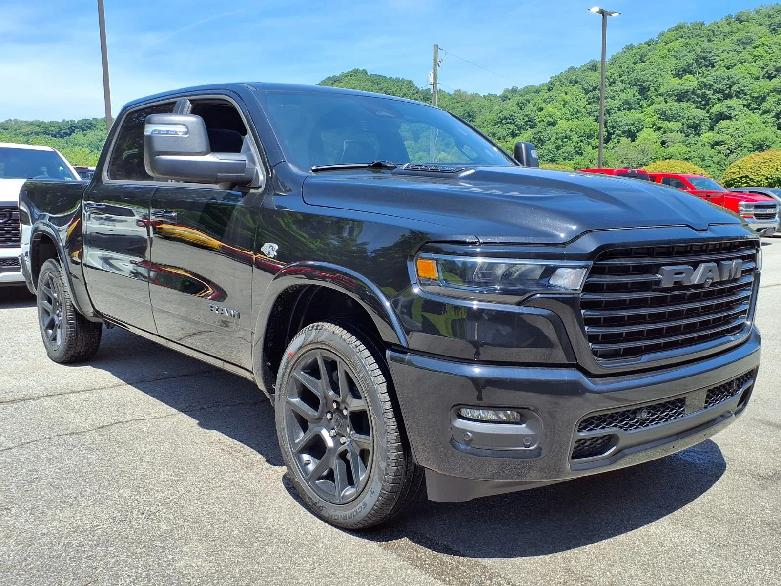 New 2026 Diamond Black Crystal Pearl-Coat Exterior Paint RAM Laramie image 1