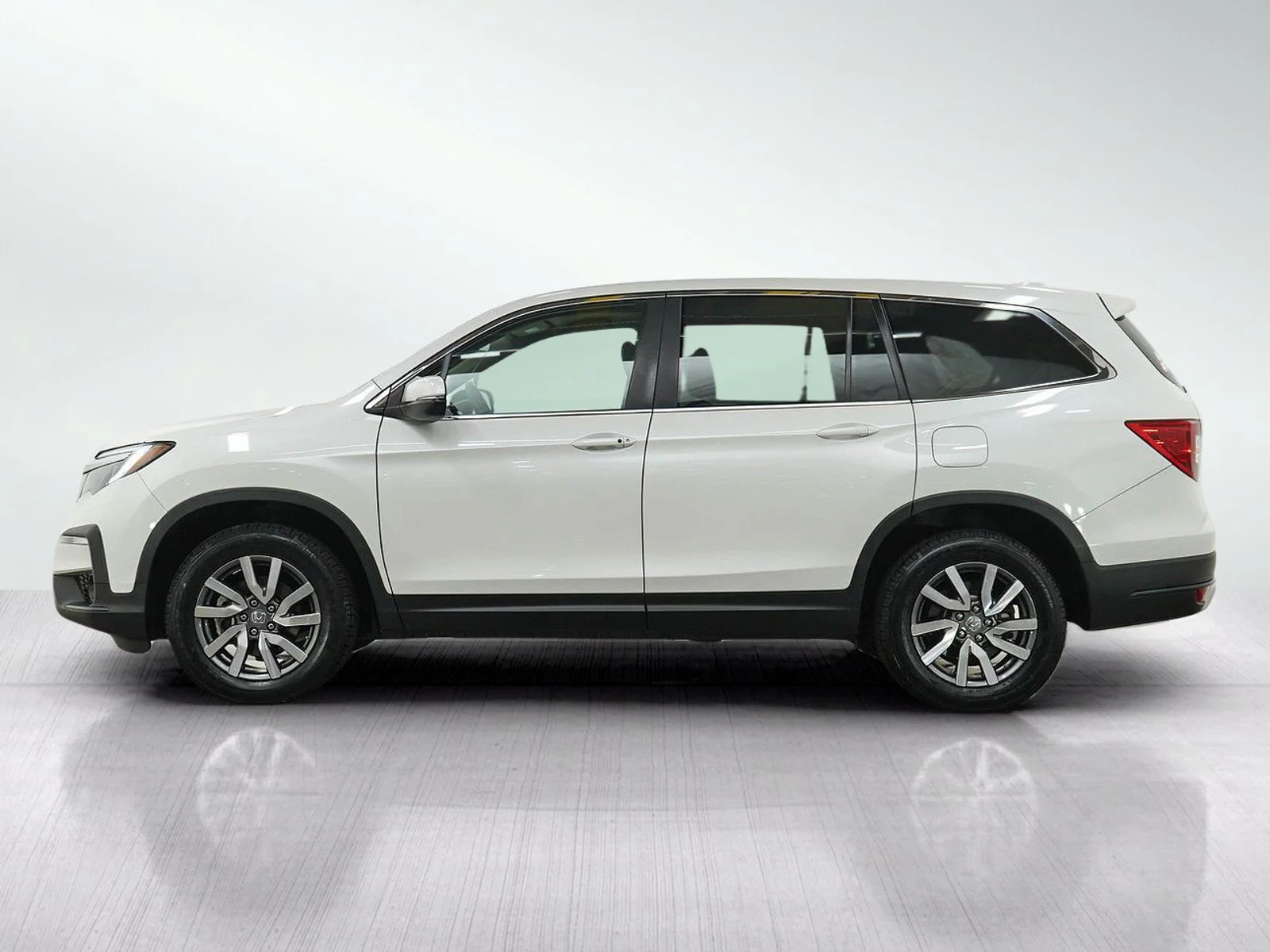 Used 2021 Honda Pilot EX-L with VIN 5FNYF6H56MB073188 for sale in Wayzata, Minnesota