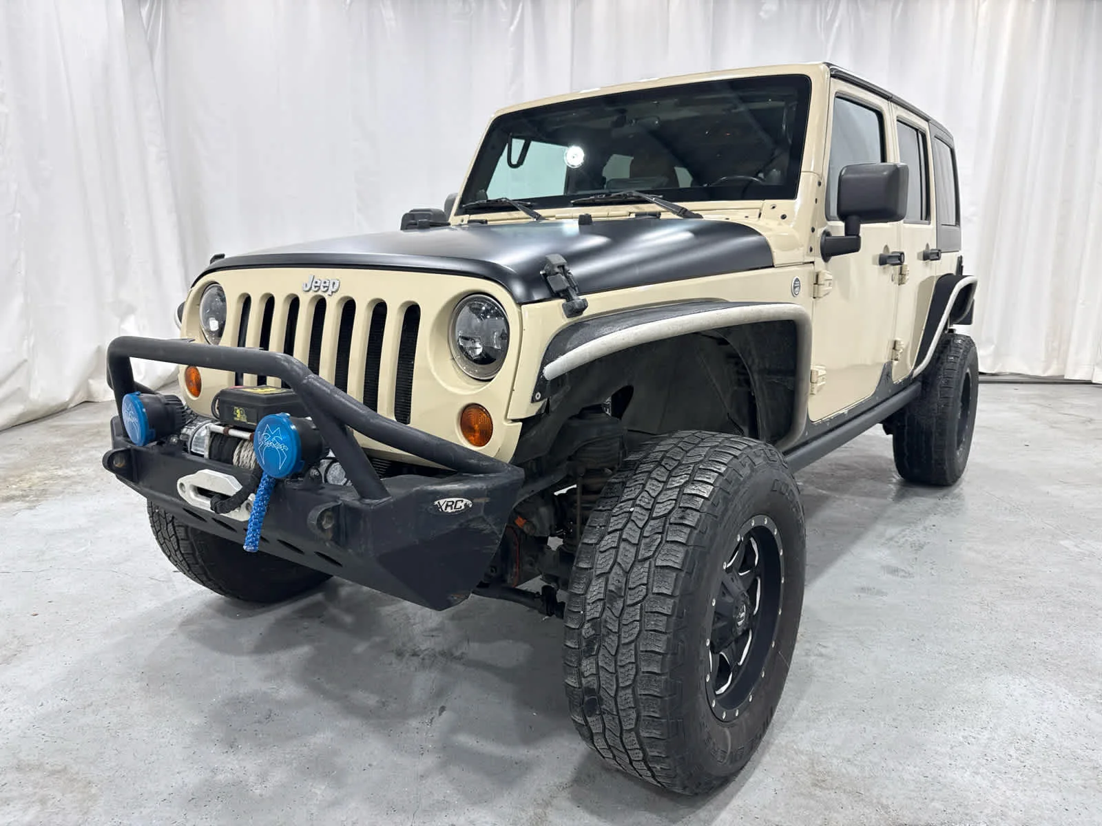 Used 2012 Tan Jeep Rubicon image 1