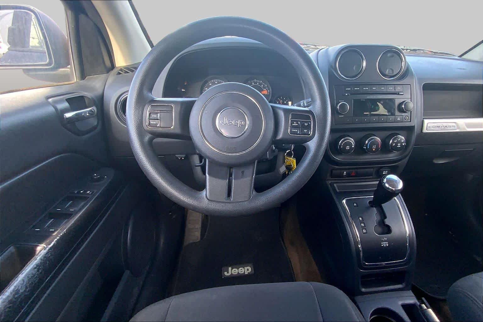 Used 2014 True Blue Pearlcoat Jeep Sport image 6