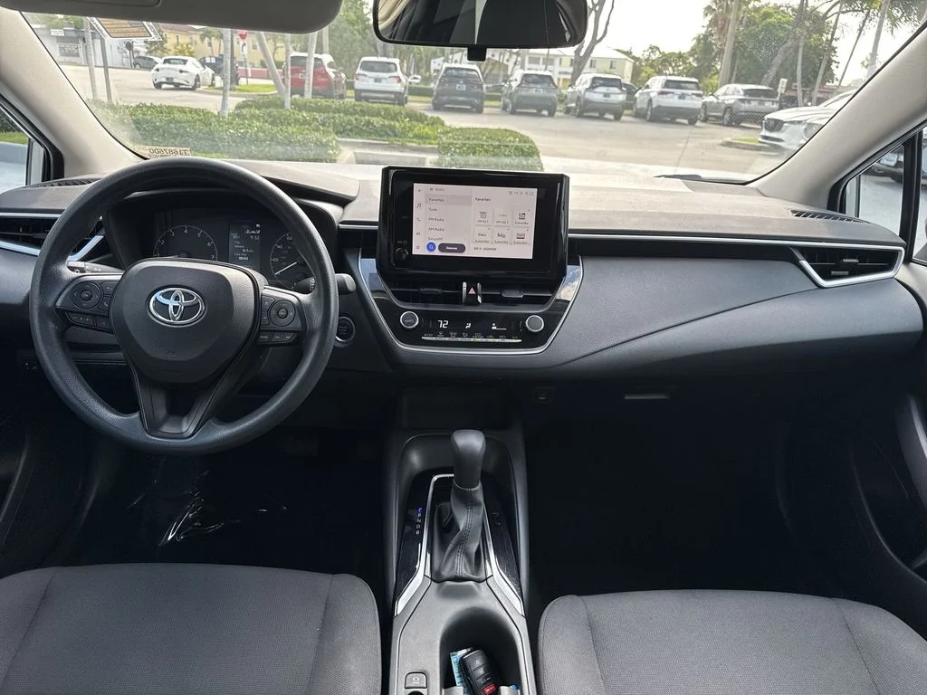 Used 2023 Classic Silver Metallic Toyota LE image 14