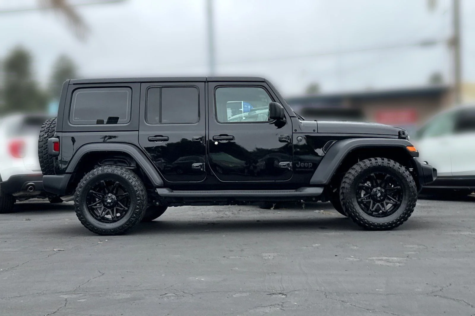 Used 2024 Black Clearcoat Jeep Sport image 26