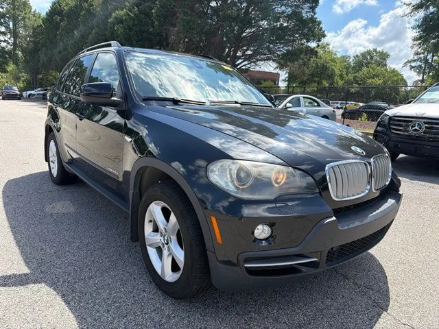 Used 2010 Black BMW xDrive35d image 1