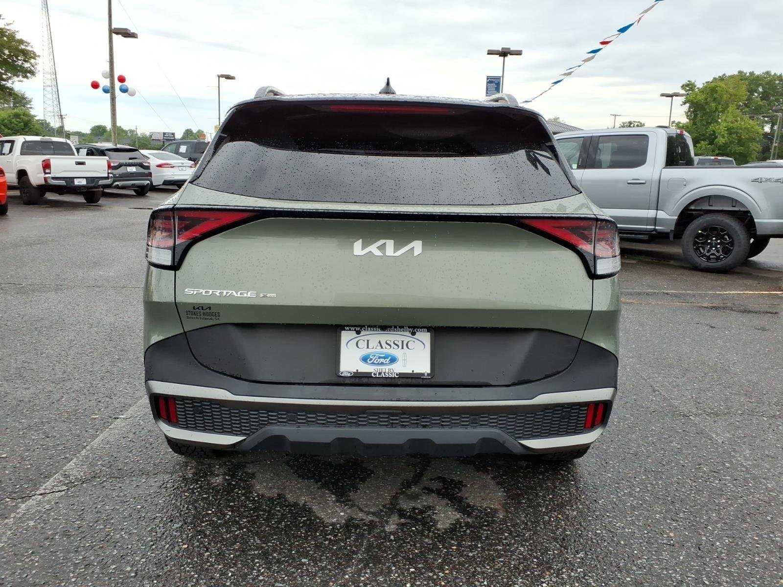Used 2024 Jungle Green/Ebony Black Roof Kia X-Pro Prestige image 5