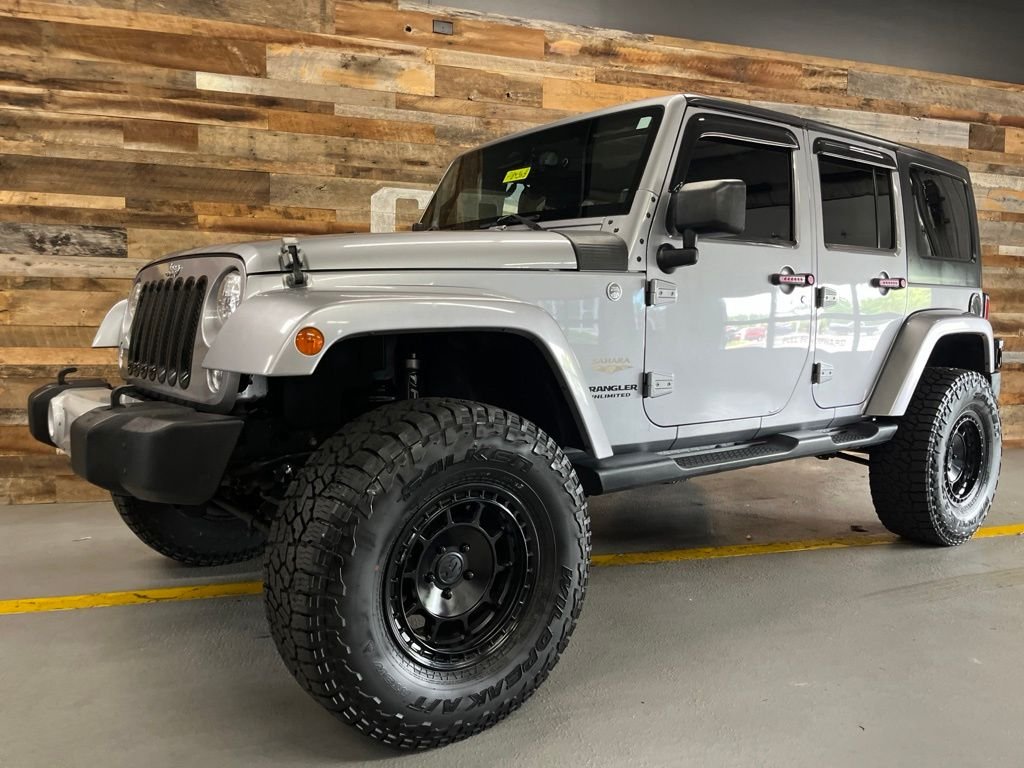 Used 2014 Billet Metallic Clearcoat Jeep Unlimited Sahara image 16