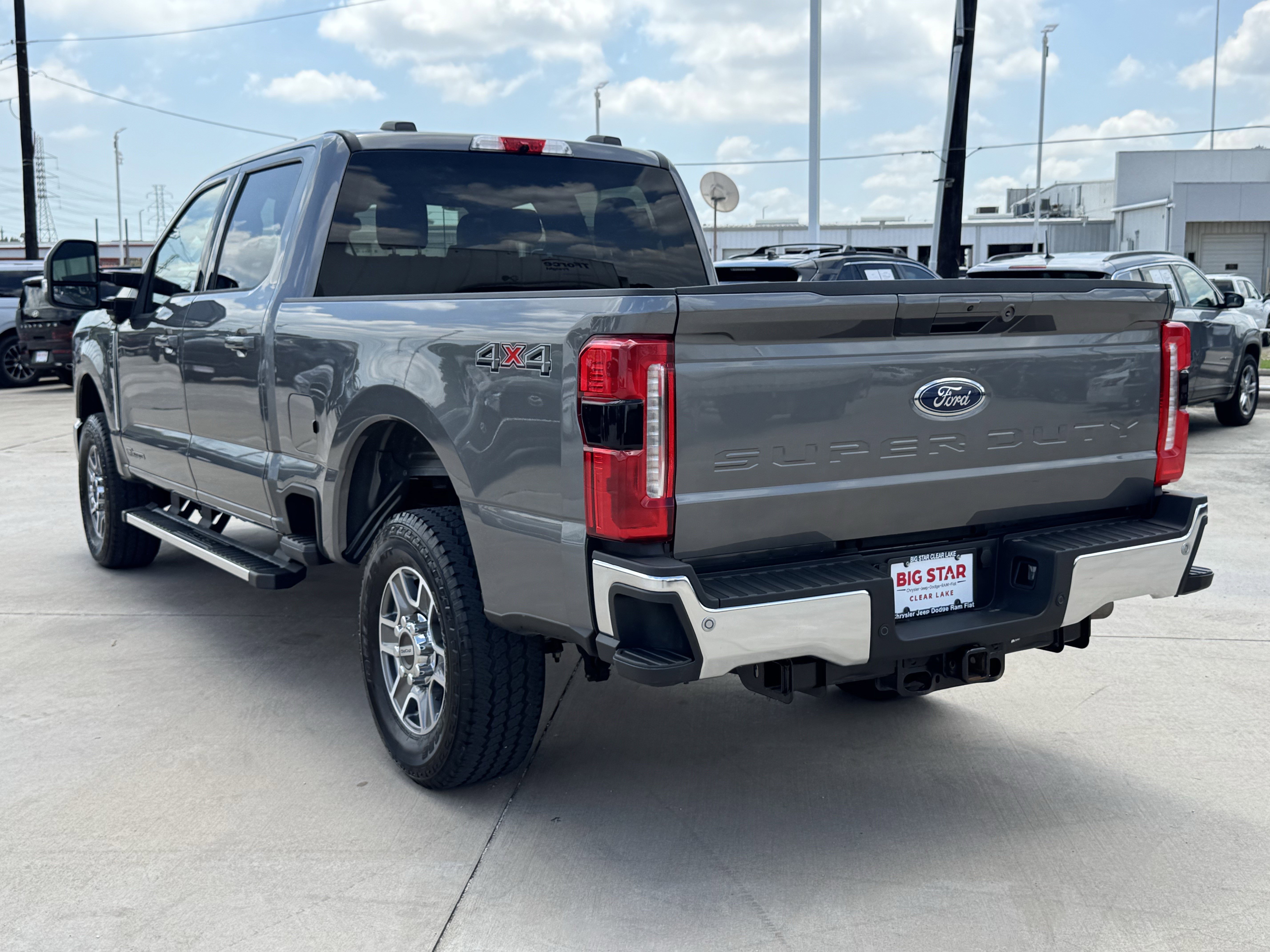 Used 2025 Gray Metallic Ford LARIAT 4WD Crew Cab 6.75