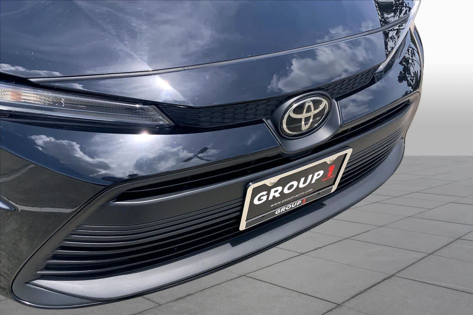 Used 2024 Midnight Black Metallic Toyota LE image 29