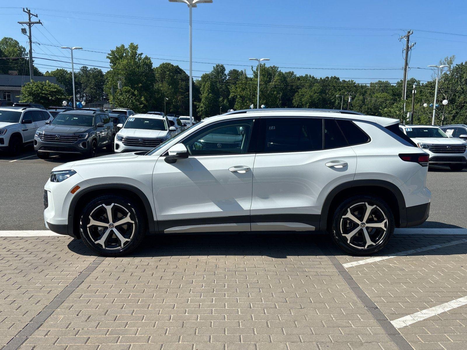 New 2026 pure white Volkswagen SE image 2